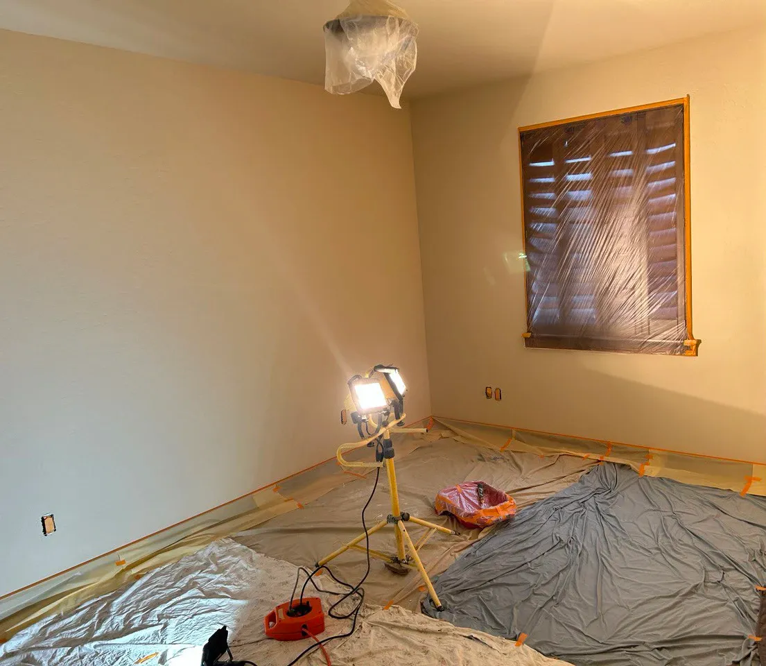 Interior room being painted in a light neutral colour